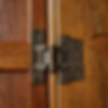 Close-up of barnwood bifold door hinges