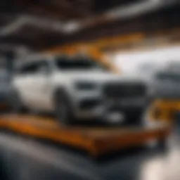 Luxury car being loaded onto enclosed transport vehicle