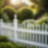 Elegant white vinyl picket fence in a lush garden setting