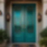 Intricate Geometric Patterns on Teal Storm Door Elegant teal storm door adorned with intricate geometric patterns