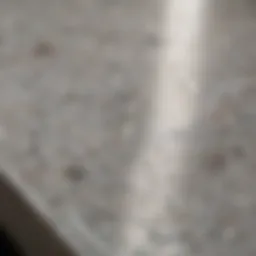 Close-up view of a polished quartz countertop showcasing its unique patterns and colors.