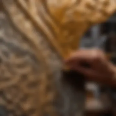 Artistic Patterns with Tintable Paint Artist using tintable metal paint to create intricate patterns on a sculpture