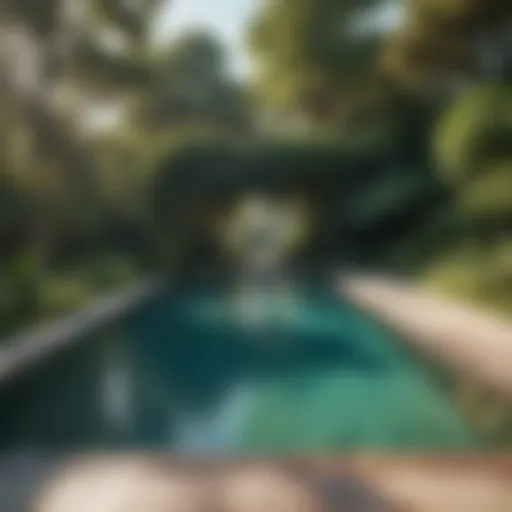 A pristine pool surrounded by lush greenery, showcasing crystal-clear water.